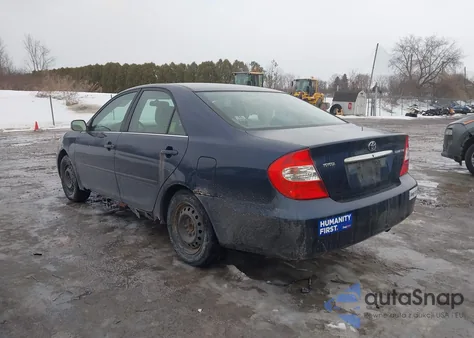 2002 Toyota Camry Le from USA, damaged, VIN 4T1BE32K82U523428